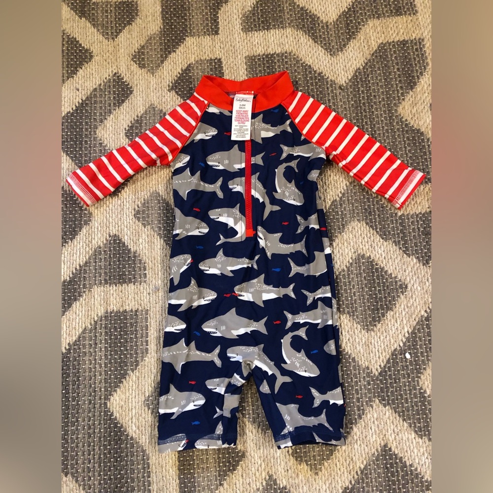 Baby Boden shark rash guard suit.